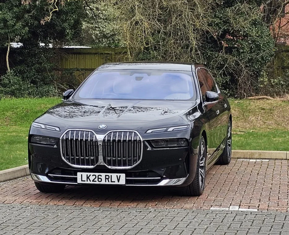 Black BMW i7 luxury electric chauffeur saloon parked in London