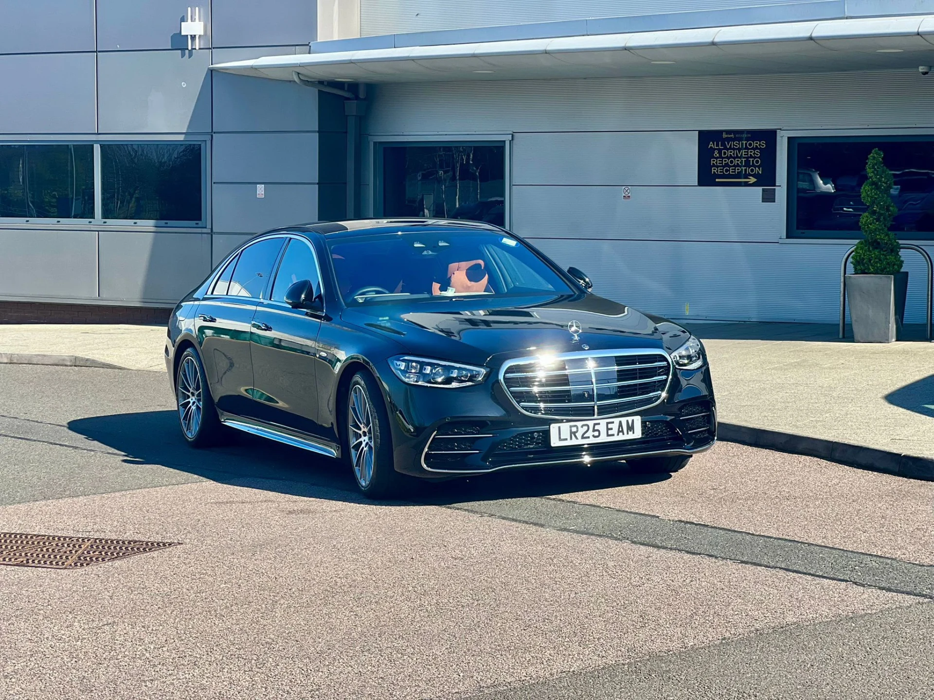 Elite Executives Mercedes-Benz S-Class parked outside Harrods Aviation private FBO terminal reception