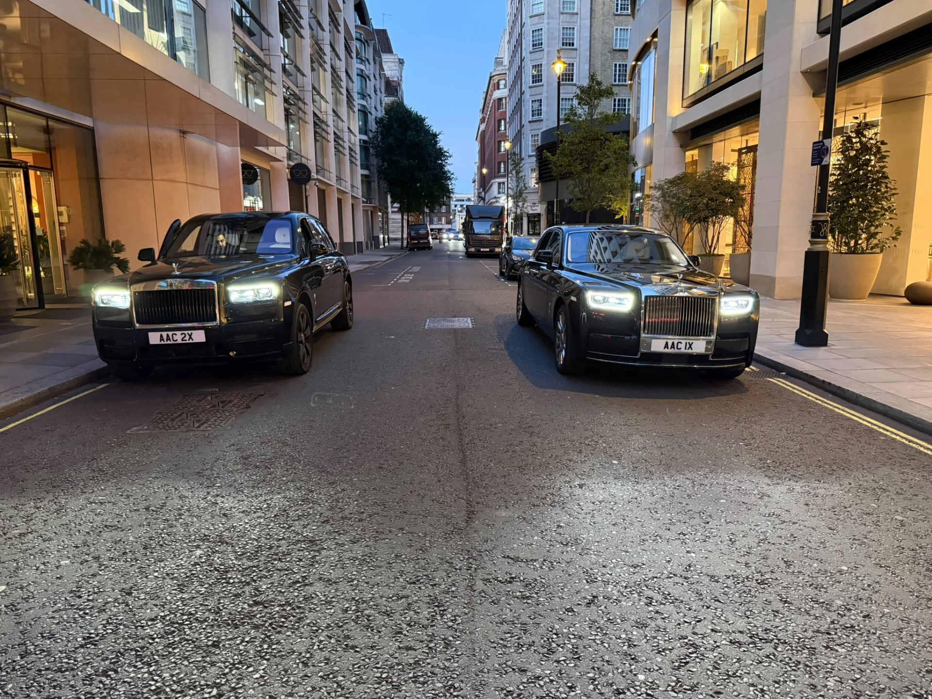 Rolls-Royce Cullinan and Rolls-Royce Phantom chauffeur fleet vehicles parked side by side in London